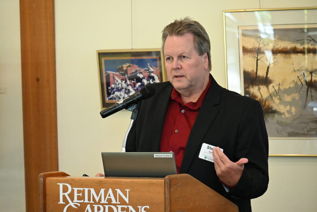 Steve Guyer of the Iowa Environmental Council speaks about the Inflation Reduction Act at the September 25 Iowa School Energy Conference in Ames.