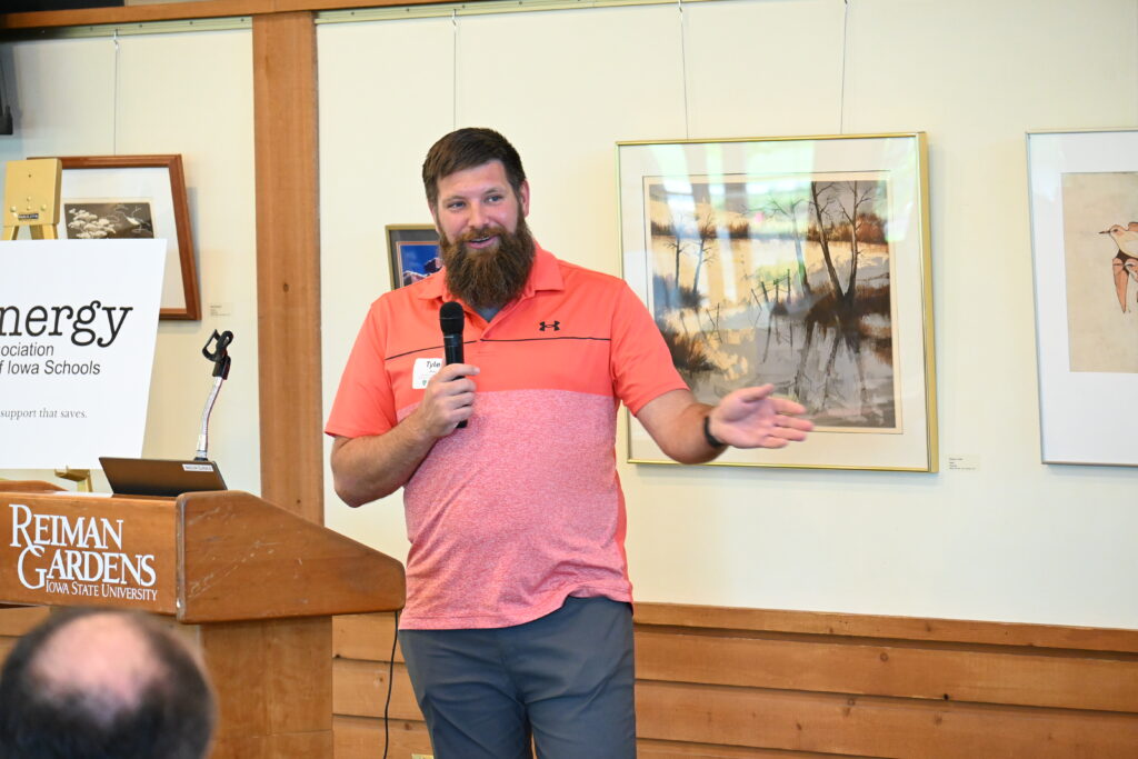 Tyler Puls of Des Moines Public Schools talks about the district's experience with solar energy.