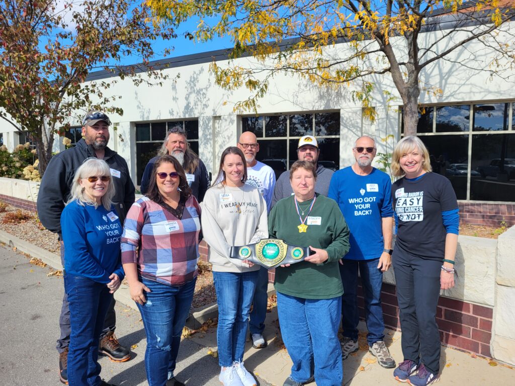 Cedar Rapids Radon Kickoff attendees celebrate their ability to test their own schools for radon.